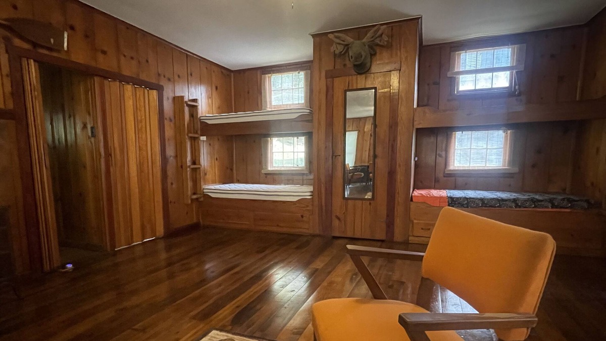 Cross Lanes Cabin | Peaceful fishin’ camp on a lake, bring your dog, and fishing pole.