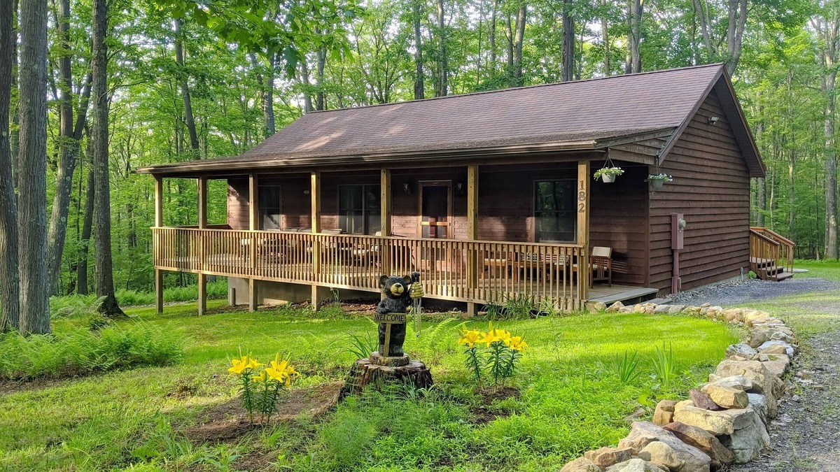 Swanton Cabin | Peaceful hideaway with large yard, hot tub, grill, firepit, smart TVs, & AC