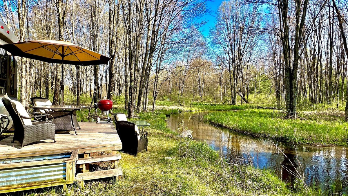 Bitely House | Peaceful stream side retreat in private forest