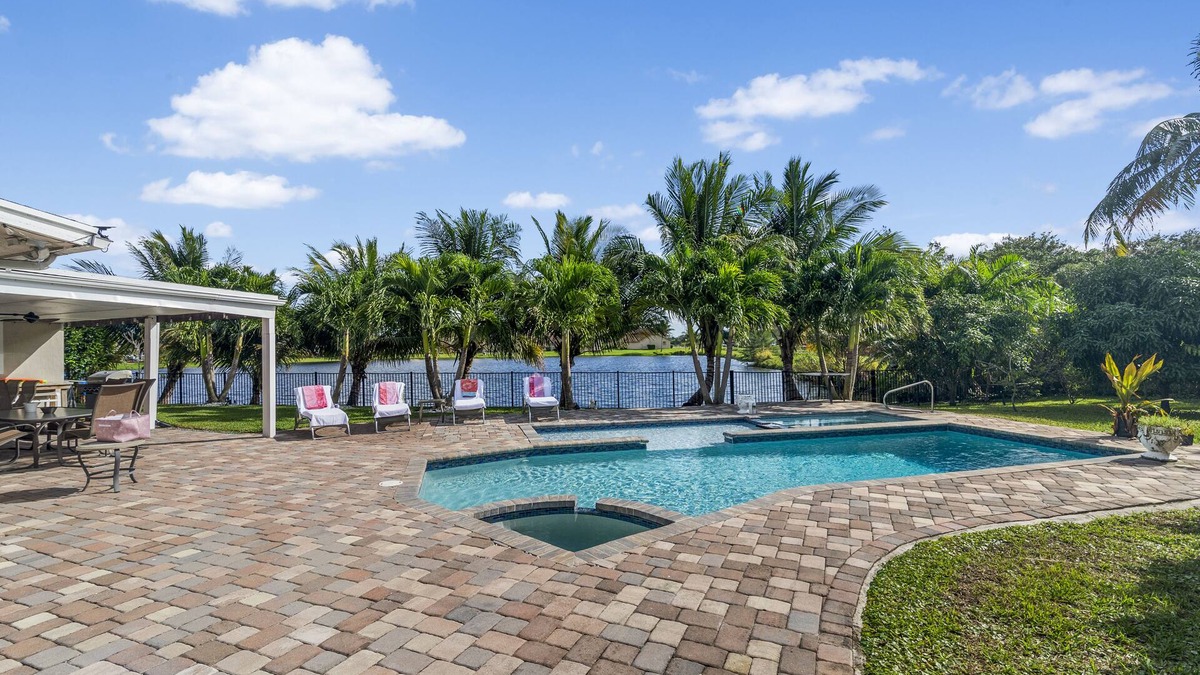 West Palm Beach House | PEACEFUL WATERFRONT 5BR/3BA HOME - PRIVATE POOL/HOT TUB/HOME THEATER