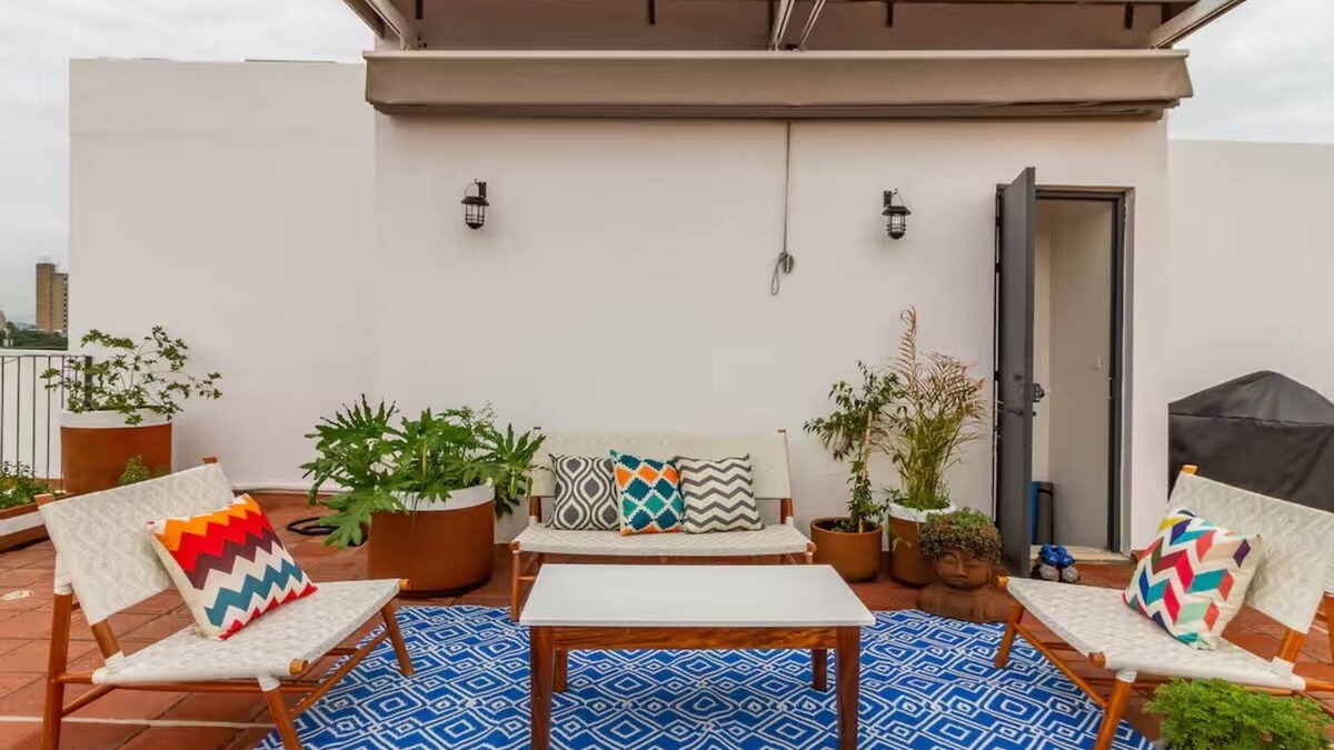 Americana Condo | Penthouse with private rooftop and panoramic views