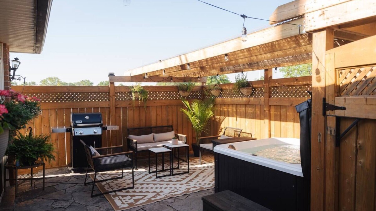 Riverside House | Perfect hideaway with a hot tub and a fireplace