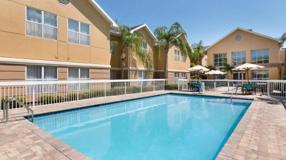 Feather Sound Hotel | Perfect Spot for Unwinding! Outdoor Pool, Free Breakfast, Full Kitchen!