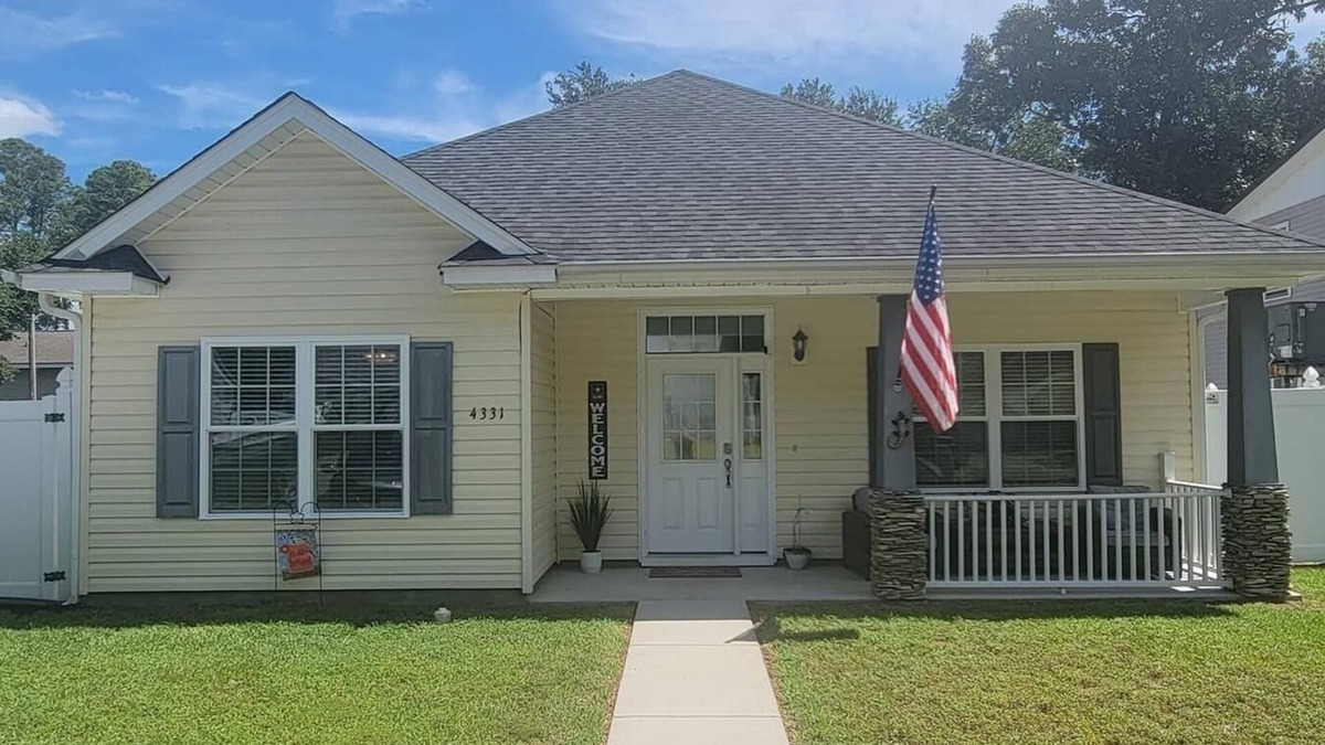 Little River House | Pet friendly 2 bed 2 bath home near golfing and walking distance to many places.