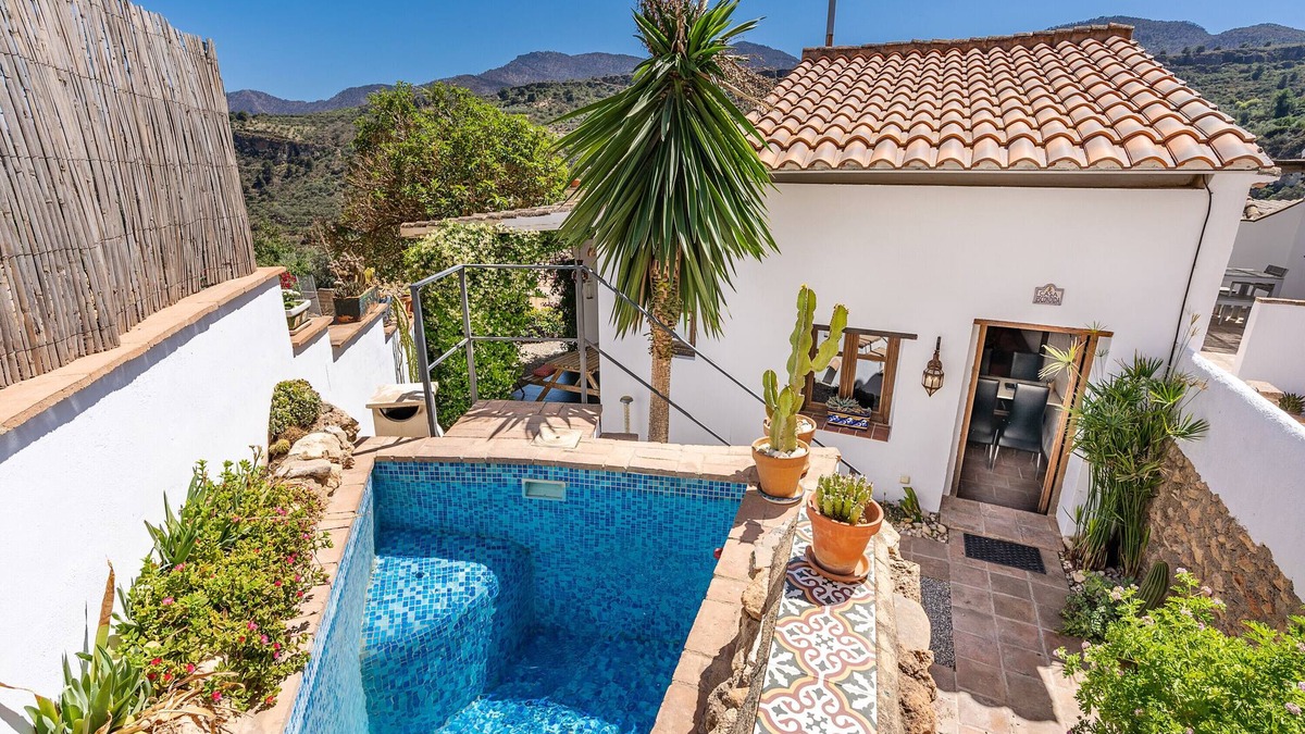 Albunuelas House | Pet-Friendly Cottage 'Casa Escondida' with Mountain View, Pool & Wi-Fi