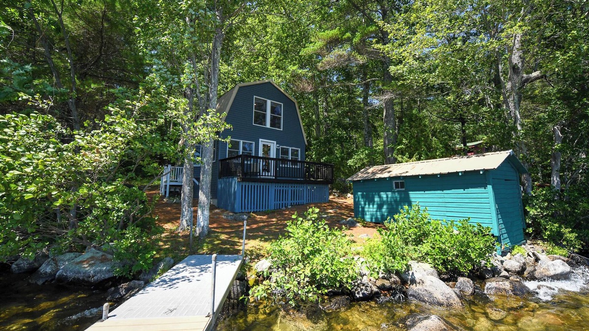 Raymond Cottage | Pet-friendly waterfront cottage just 26' from the shore of Panther Pond!