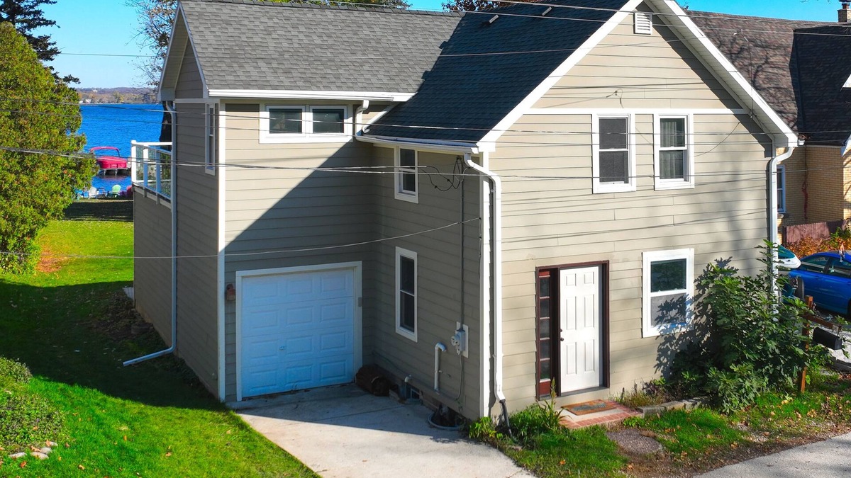 Pewaukee House | Pewaukee Lake Home, w/Dock, Gas Grill, Large Deck, near Boat Launch & Town