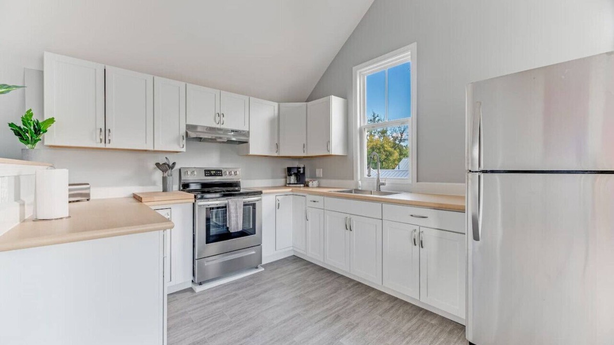 Costigan Apartment | Picturesque Riverfront | 4 BD | Parking Provided