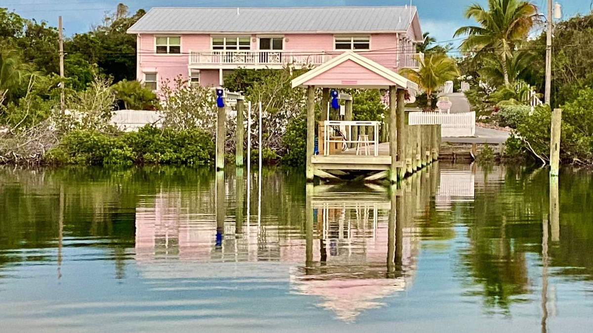 Treasure Cay House | Pink Bikini Island Cottage with a dock on Black Sound