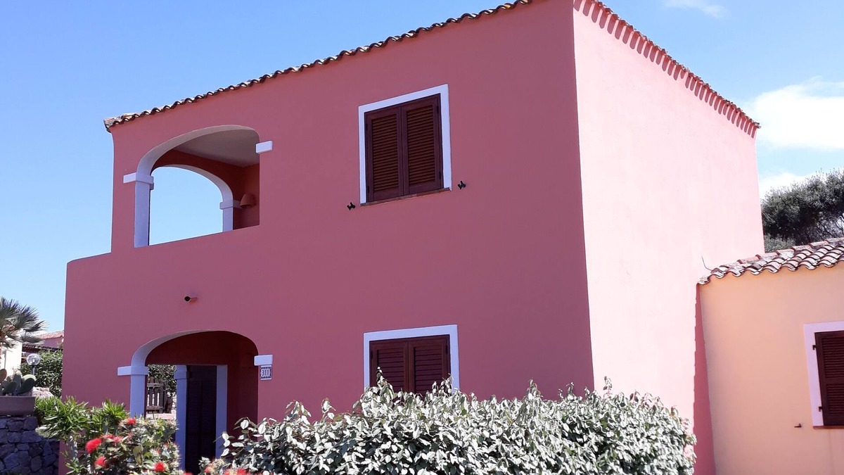 Aglientu Apartment | Pink house in residence with pool, wifi -air conditioner, near the sea
