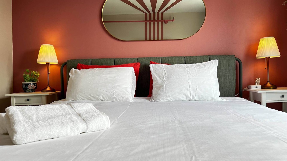 Downtown Apartment | Pink Sunrise: Energetic Studio, Bold Decor
