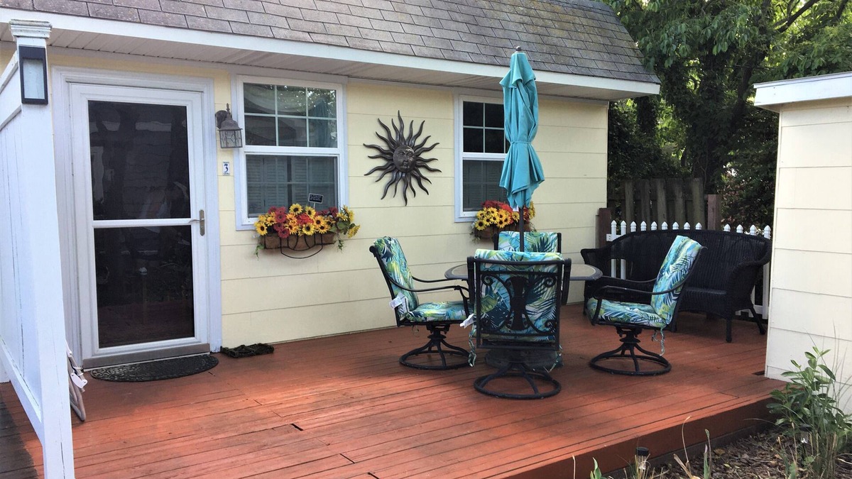 Rehoboth by the Sea Cottage | Piper Cottage - 100 Steps to Beach - Private Deck and Garden Area