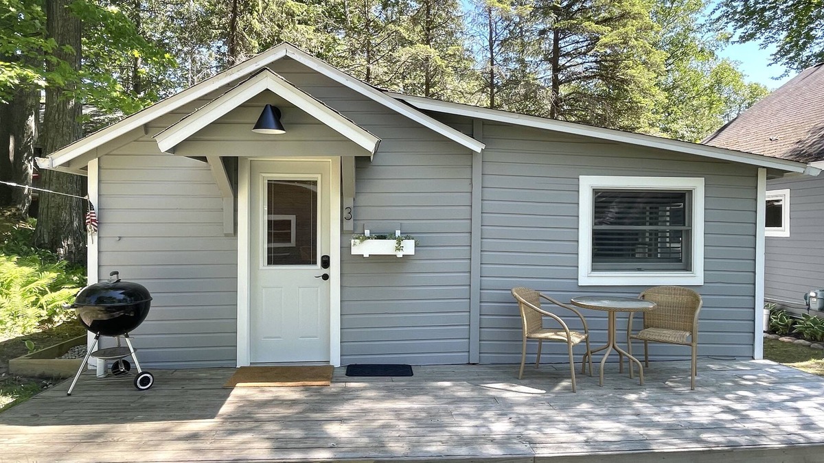 Honor Cottage | Platte Lake Waterfront Cottage with beach and swimming dock