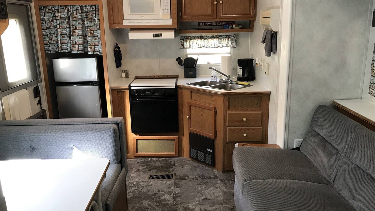 Benzonia House | Platte - RV Camper in the Woods with Fire pit & Hot Tub Access