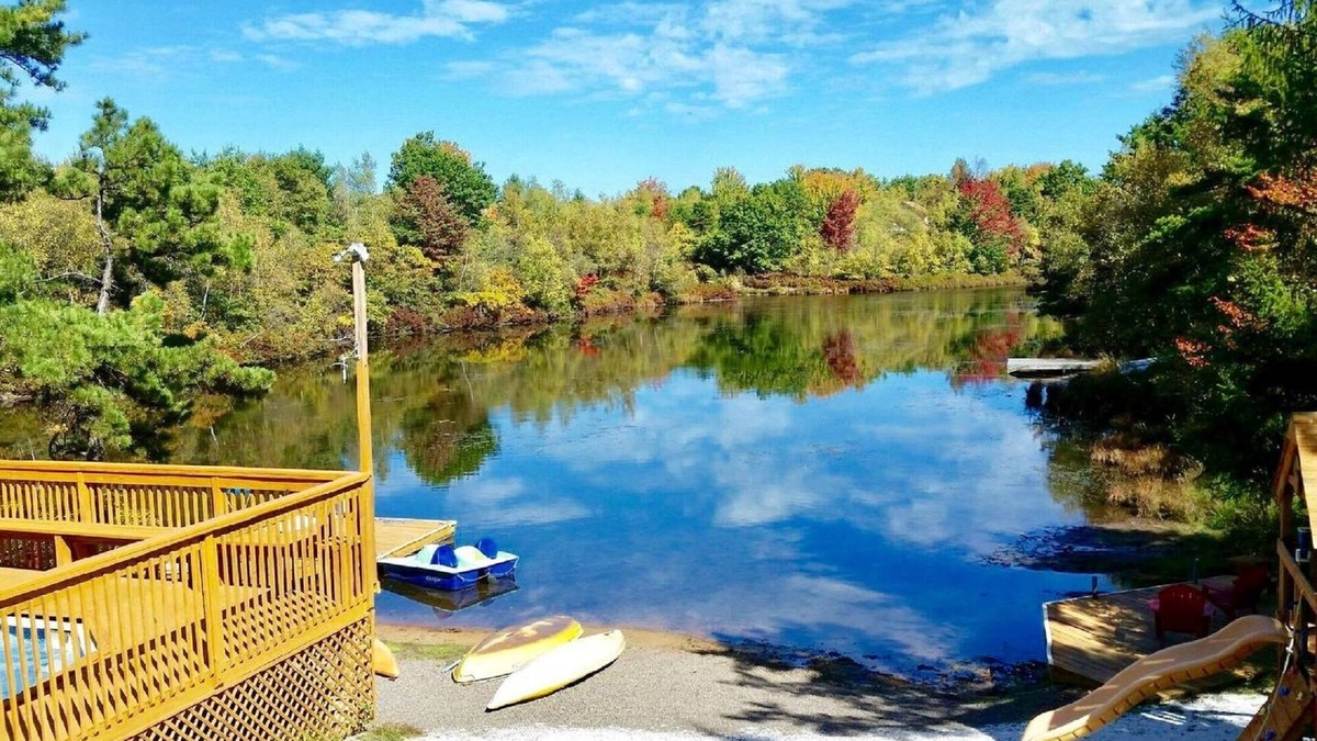 Long Pond House | Pocono Lakefront Onsite Swimming Pool/Hot Tub, Playset/2 docks/Sandy Beach/Boats