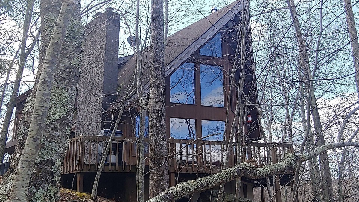 Cresco House | Pocono Private lake setting with, Hot Tub, boat dock, fishing, Swimming, Canoe