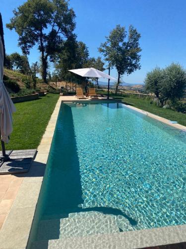 Pancole Villa | PODERE TORRICELLE 69B Pancole Gr, seaview infinity pool, jacuzzi, sauna, exclusive villa with 2 bedrooms for 4 - If you total 5 or 6 people there is an independent suite in main villa with private ensuite bathroom, kitchenette and garden dining area