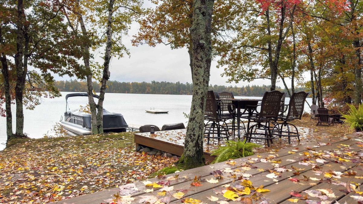 Iron River Cabin | Pontoon Rental Lakefront Stay with Bonfire