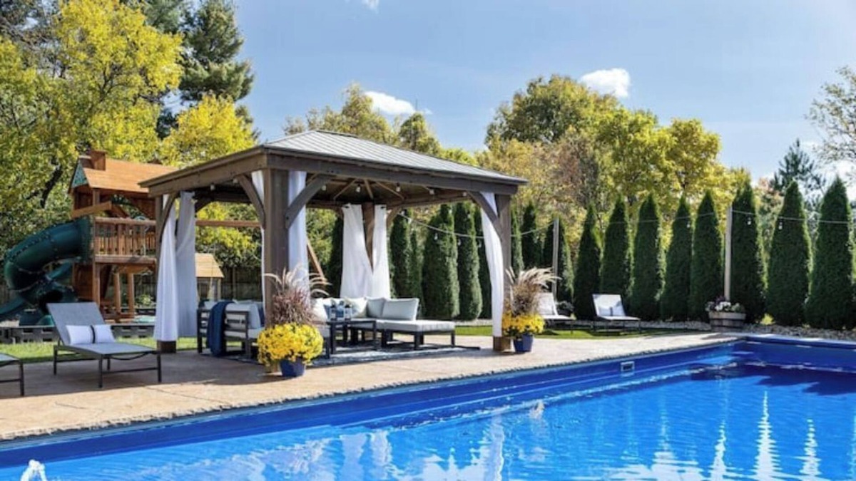 Northwest Columbus House | Pool, Oasis, Outdoor fire, 2 King bed suites, Theater, Workout room, Playground