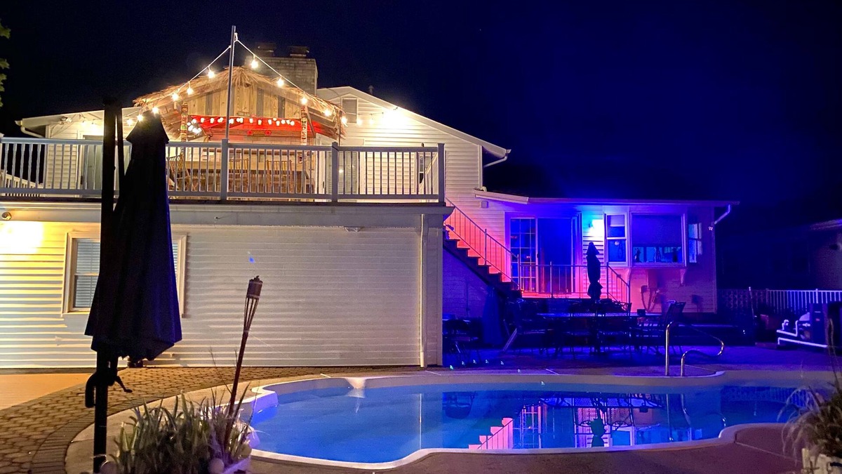 Osborn Island House | POOL, TIKI BAR, WATERFRONT home, 8 LBI Beach passes in Mystic Island NJ