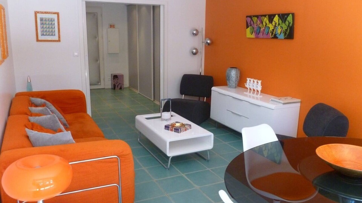 La Baule-Escoublac Apartment | Pop design apartment, renewed in 2008, terraces in the garden, heart of La Baule