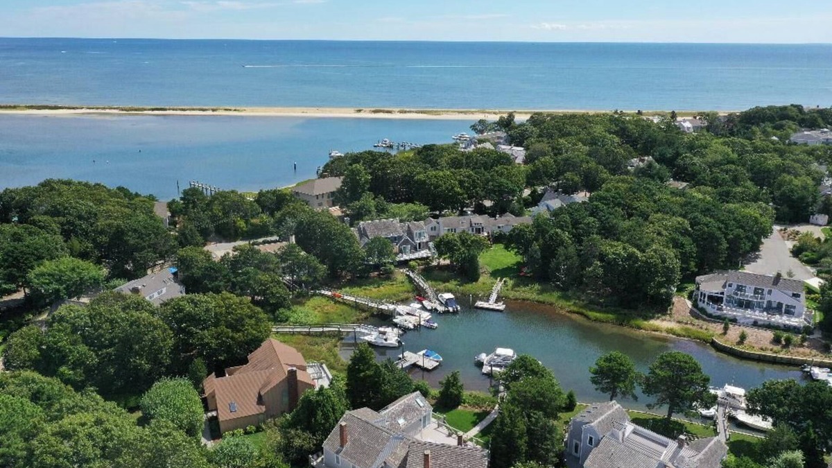 Popponesset Island House | Popponesset Isl Designer Expanded Ranch with Deepwater Dock "The Goldfish House"