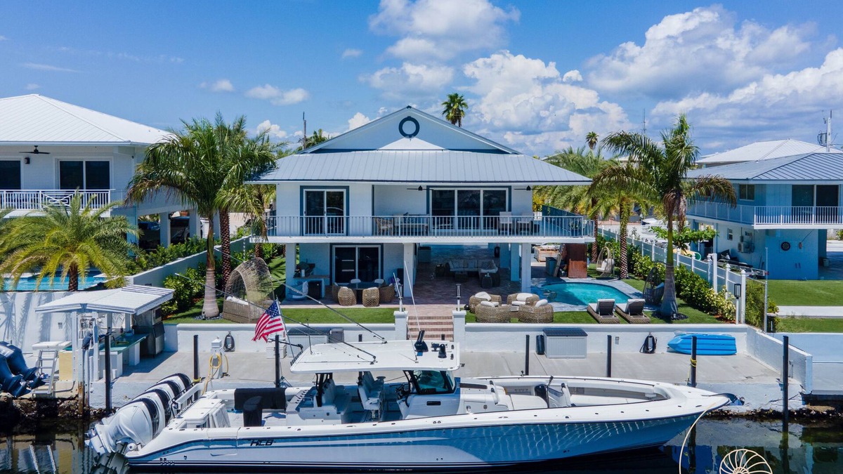 Key Largo House | Port Largo Stunner! 5 Bed/4 Bath Relaxed Luxury Home with Pool & Dockage