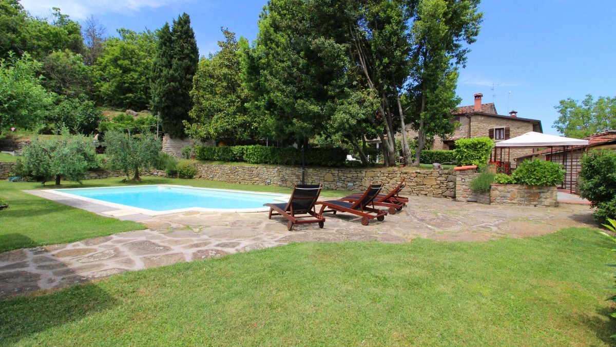 Castel Focognano Villa | Portion of an old stone country house, well-kept garden and private swimming pool. Situated a few km