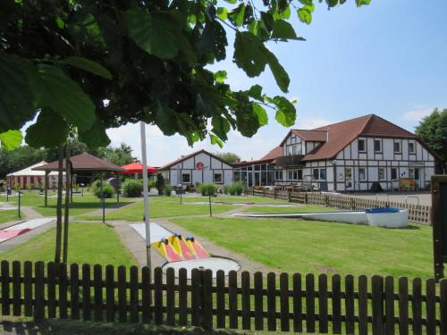 Hollern House | Premium-Ferienhaus Herbstprinz im Feriendorf Altes Land direkt an der Elbe