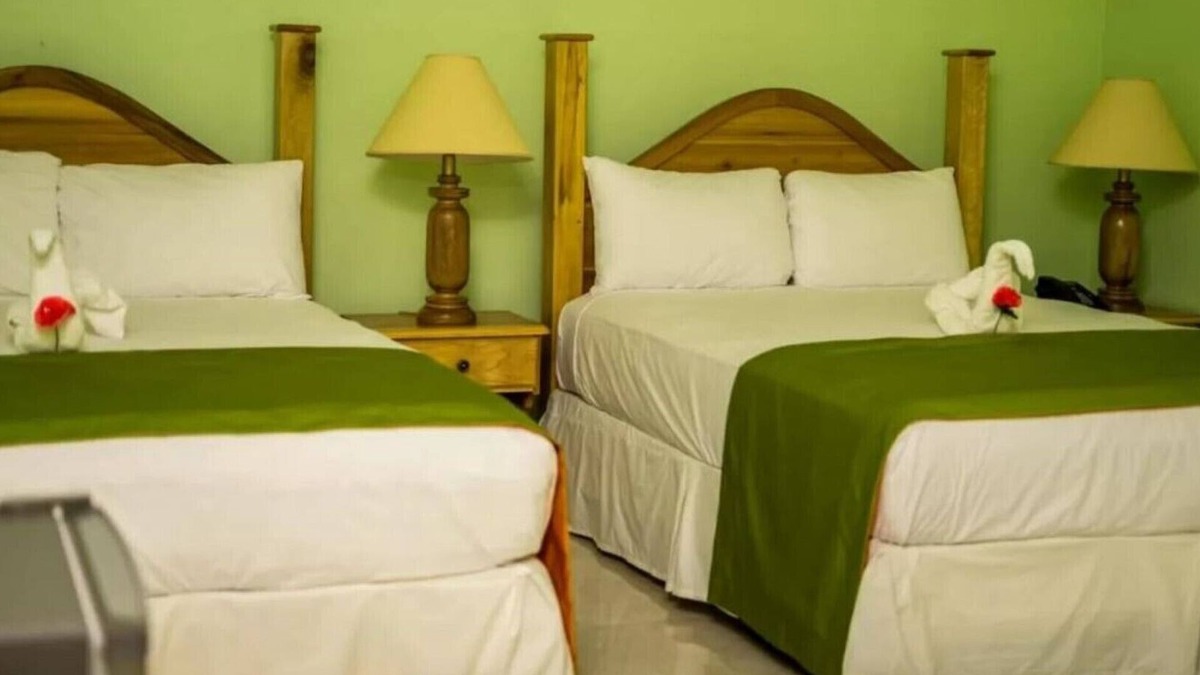 Runaway Bay Resort | Premium triple, multiple beds, garden views