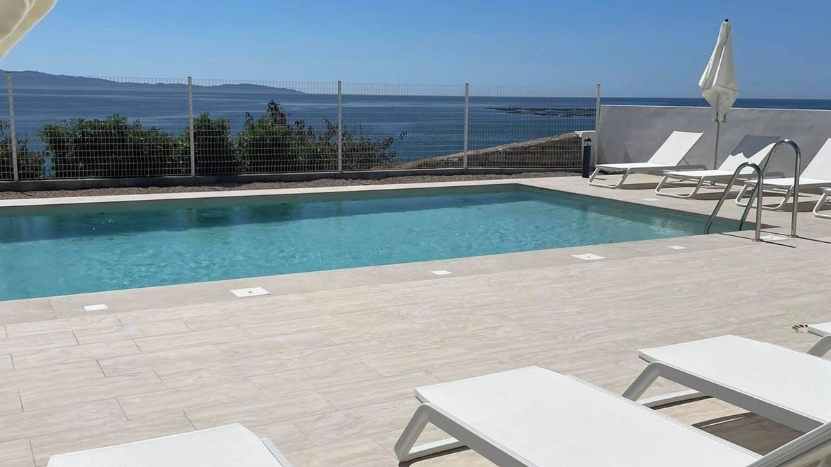 Corse-du-Sud Apartment | PRESTIGIOUS SEAFRONT 3-BEDROOM APARTMENT RENTAL WITH HEATED POOL