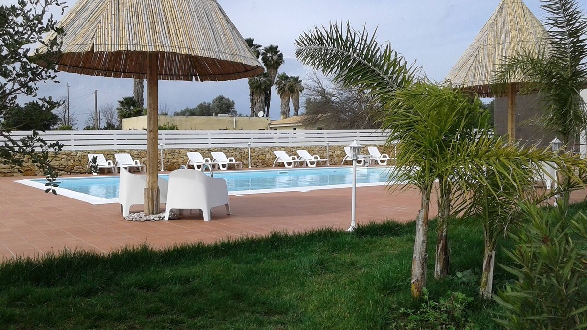 Fanusa Villa | prestigious villa with swimming pool surrounded by greenery near the sea