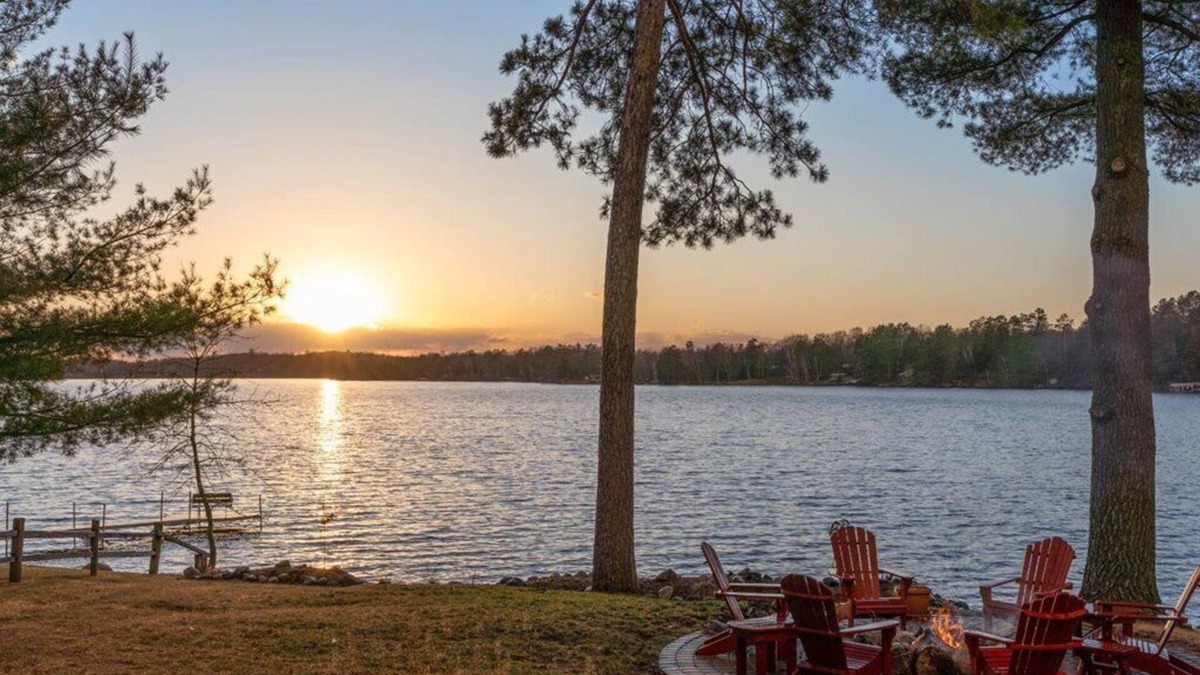 Emily House | Pristine home with sandy beach, firepit, dock and pontoon. ATV trails nearby.