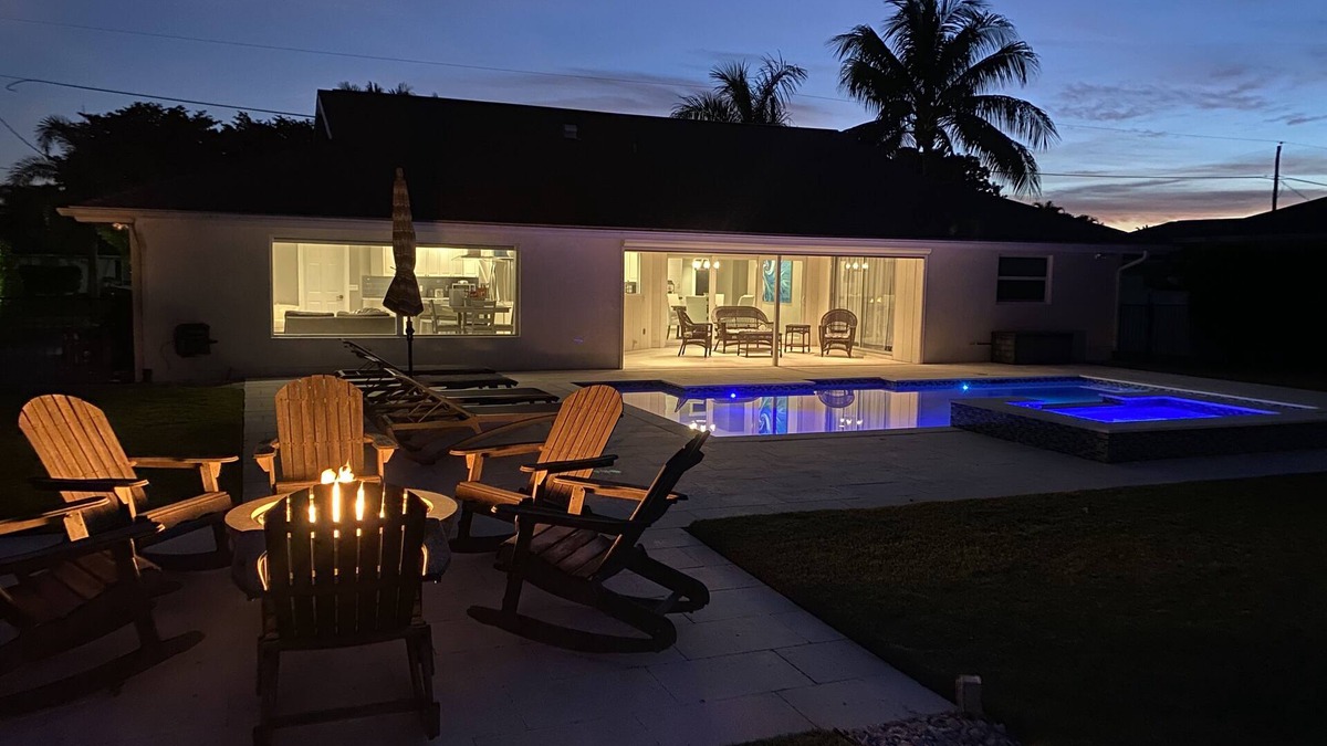 Palm River Estates House | Pristine Lake Home, Heated Pool, Gas Fire Pit, Fenced Yard