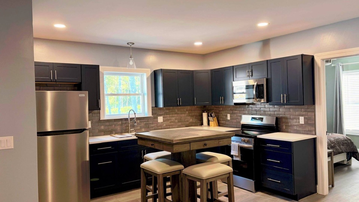 Palmyra Apartment | Pristine upscale 2 bedroom duplex unit surrounded by forest.