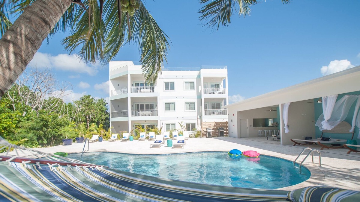 West Bay Condo | Private 7 Mile Beach Beach Club. Ocean views from Roof Terrace and Pool Pavilion