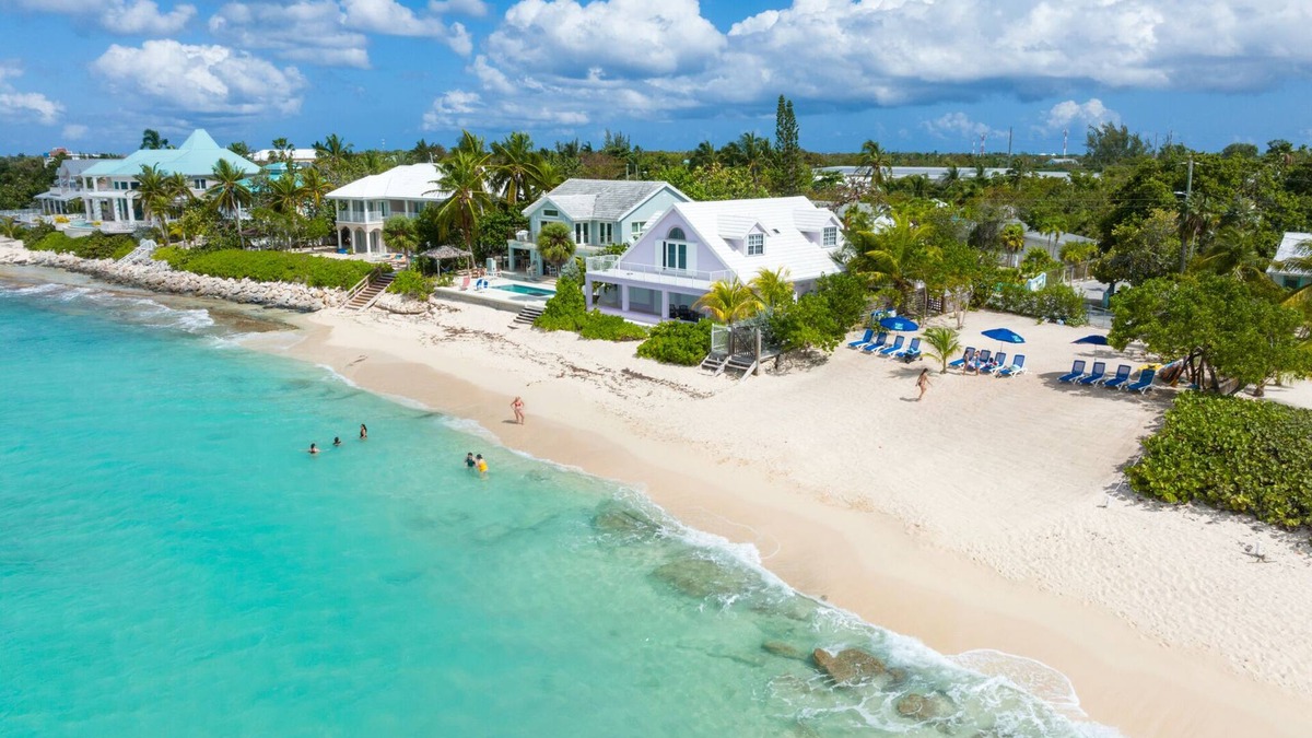 West Bay Condo | Private 7 Mile Beach Beach Club. Ocean views from Roof Terrace and Pool Pavilion