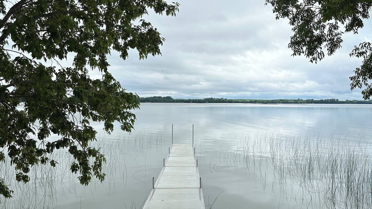 Ashby House | Private 9 acre Peninsula on Pelican Lake in Ashby.