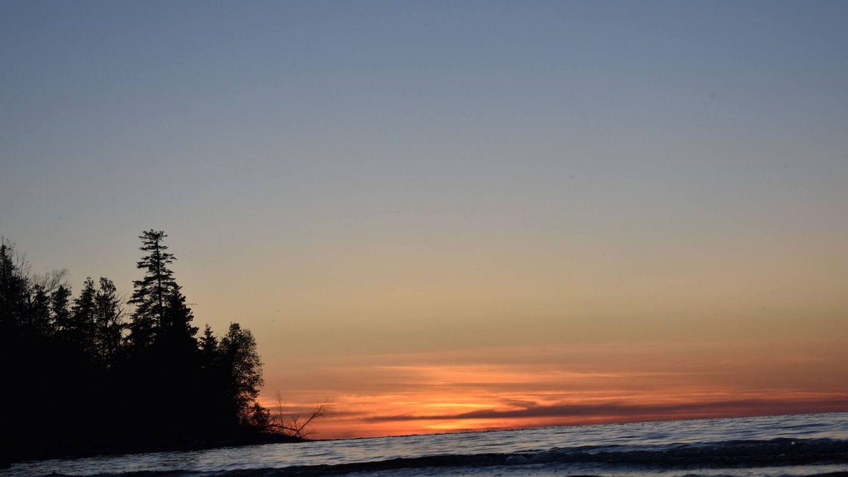 Carp Lake Cottage | Private and secluded lakefront 15 Minutes From Mackinaw City