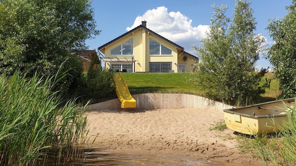 Lobnitz House | Private beach! NEW villa "Cloudless" with fireplace and sauna right on the beach