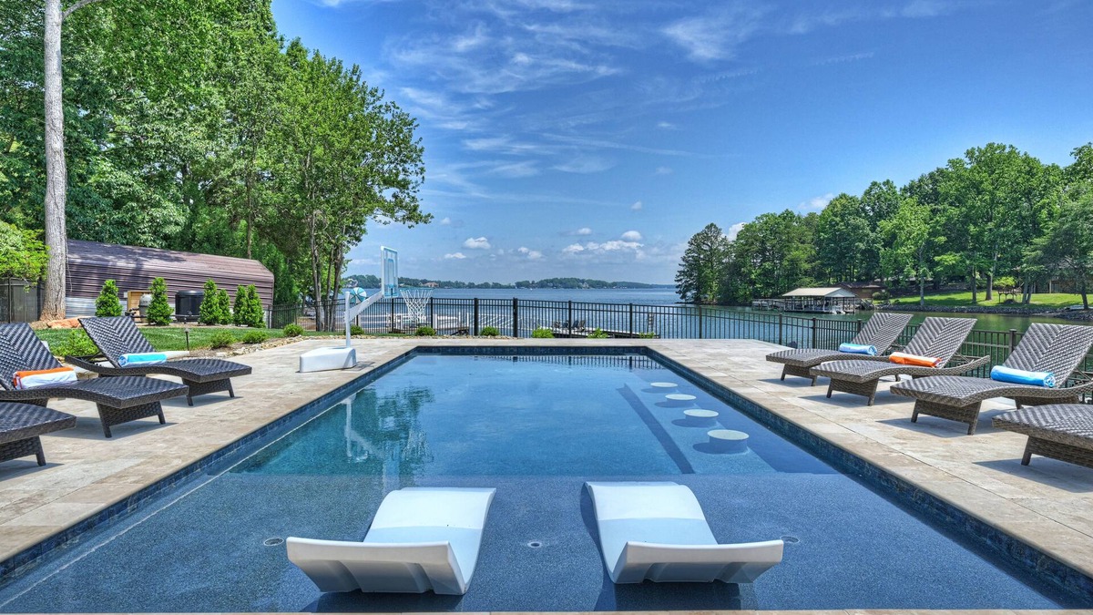 Denver House | Private Dock, Boat Ramp, Saltwater Pool & Waterfront Firepit | Bright Water Cove