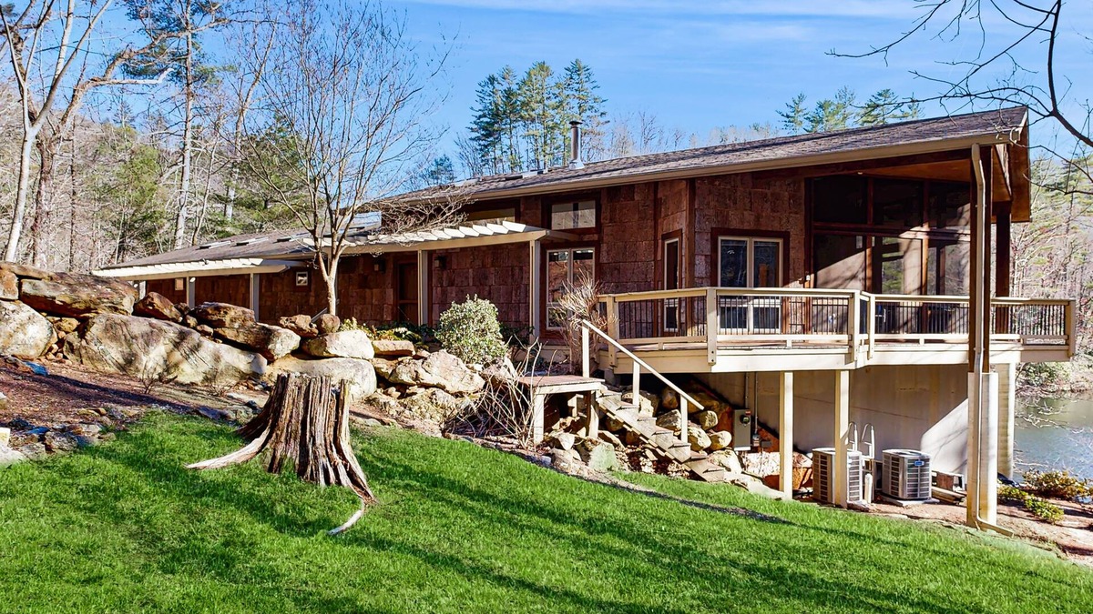Tuckasegee House | Private eco-retreat with screened porch, play area, & wood stove