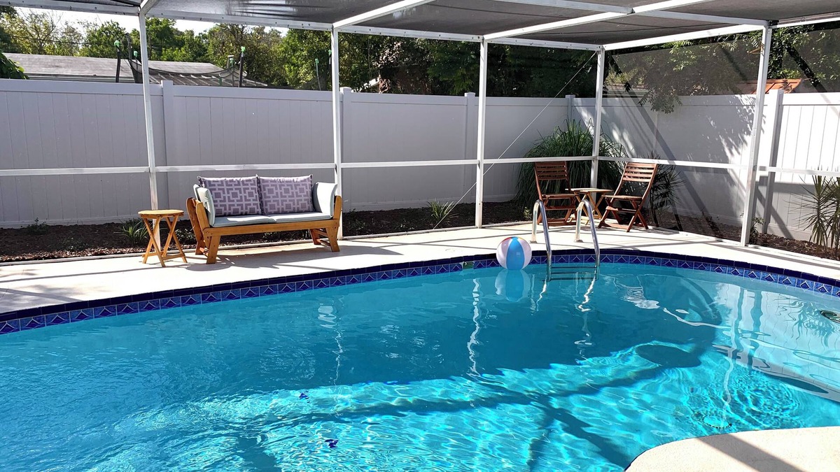 New Port Richey House | Private Fenced Backyard Oasis w/Pool, Firepit & Patio-3 King Beds & 3 Full Bath
