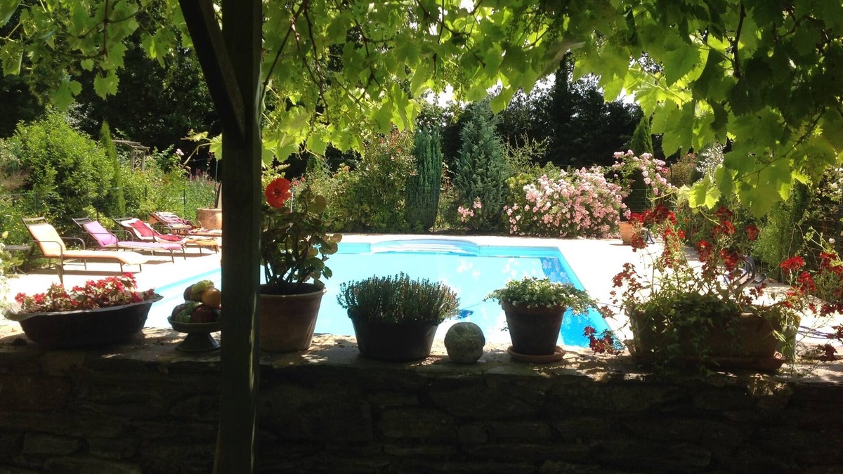 Ploermel House | Private heated pool, disabled access on ground floor, Gardens, quiet, family