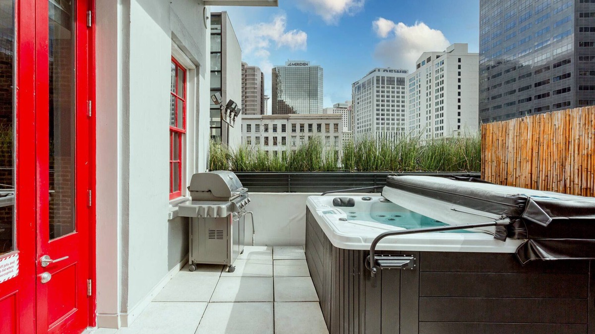 Central Business District Condo | Private Hot Tub, Patio, & Grill! Heated Pool in Courtyard, Family Friendly