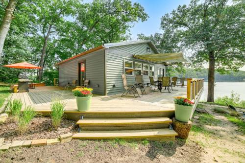 Smyrna House | Private Island Home in Belding with Dock and Grill!