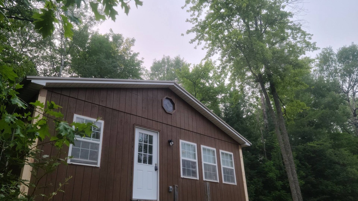 Curtis Township House | Private lake! Paddle boat and rowboat. Perfect for hunting/fishing