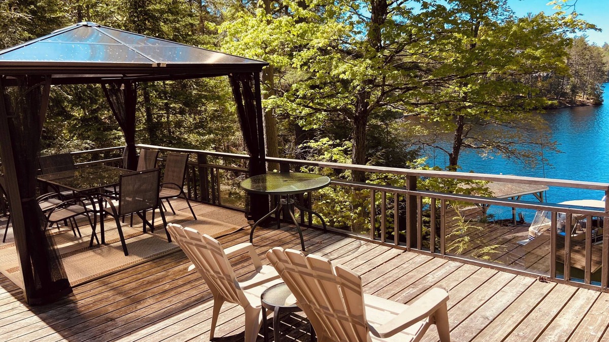 Tudor and Cashel Cabin | Private Lakefront 3 Bedroom Cabin with Private Dock and Boat Port. Boat Access