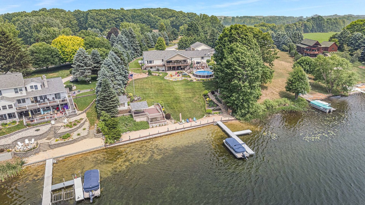 Vestaburg Cottage | Private lakefront home. Sandy beach canoe, 2 kayaks. Pool, Spa & Pontoon rental.