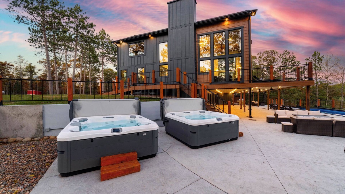 Minong Cabin | Private Lakeside Mansion - Heated Pool - Two Hot tubs - Home Theater - 10000SF